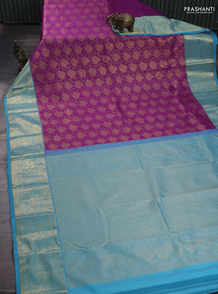 Kanchipuram silk saree purple and blue with allover zari woven brocade weaves and long zari woven border