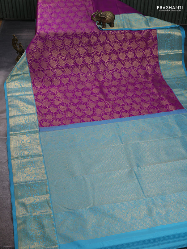 Kanchipuram silk saree purple and blue with allover zari woven brocade weaves and long zari woven border
