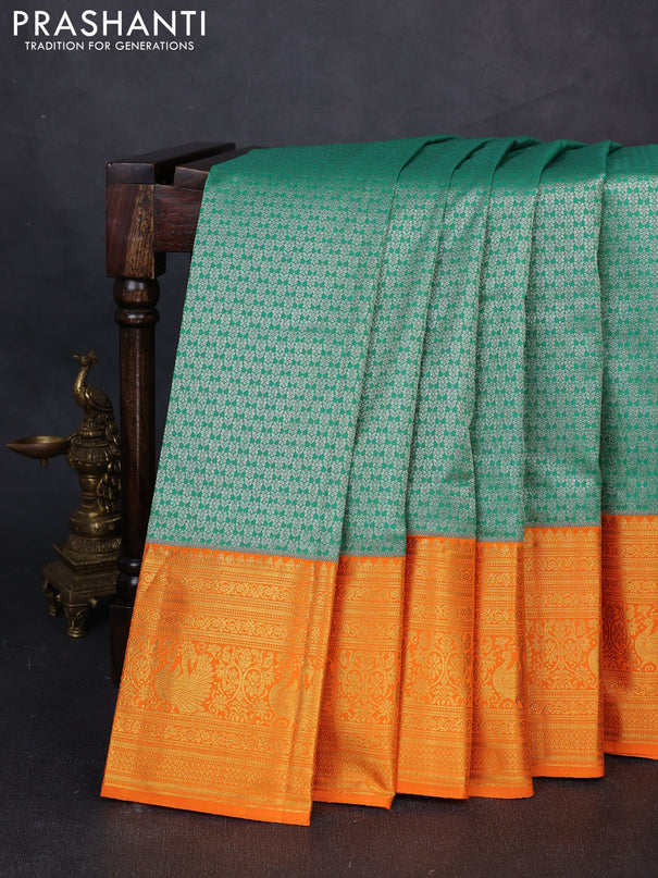 Kanchipuram silk saree green and orange with allover zari woven brocade weaves and long zari woven border