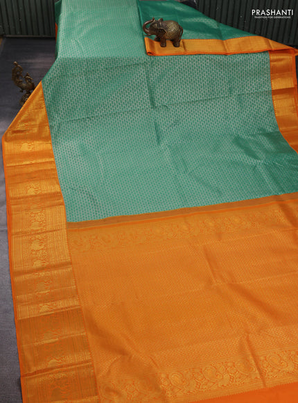 Kanchipuram silk saree green and orange with allover zari woven brocade weaves and long zari woven border