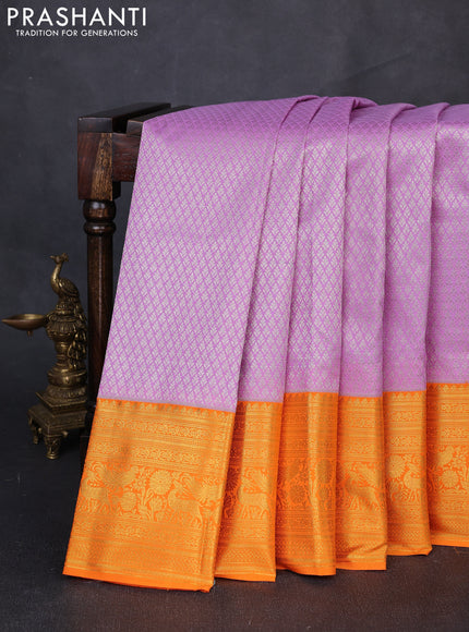 Kanchipuram silk saree lavender and orange with allover zari woven brocade weaves and long zari woven border