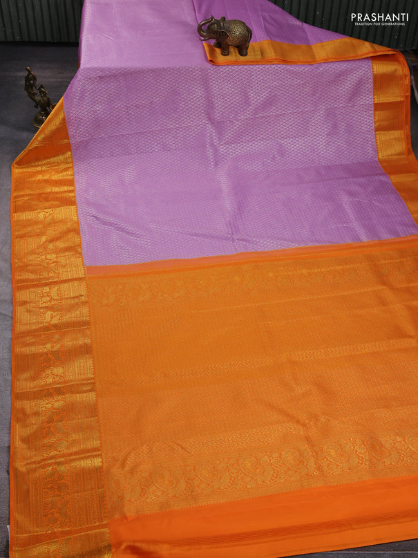 Kanchipuram silk saree lavender and orange with allover zari woven brocade weaves and long zari woven border