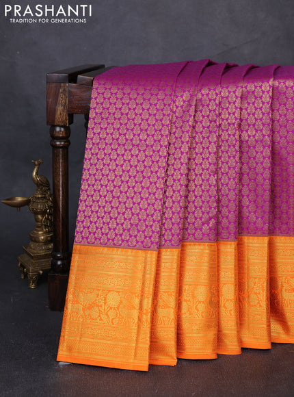 Kanchipuram silk saree magenta pink and orange with allover zari woven brocade weaves and long zari woven border