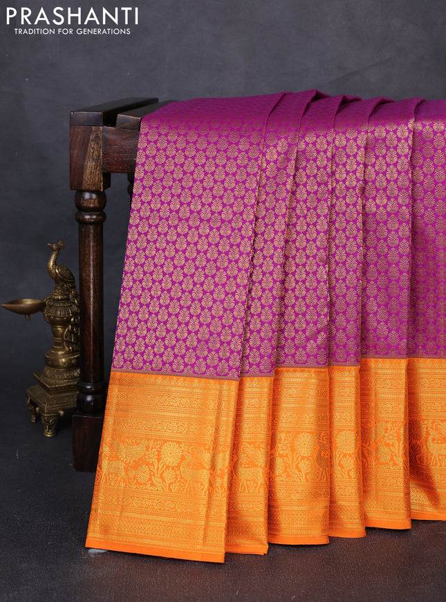 Kanchipuram silk saree magenta pink and orange with allover zari woven brocade weaves and long zari woven border