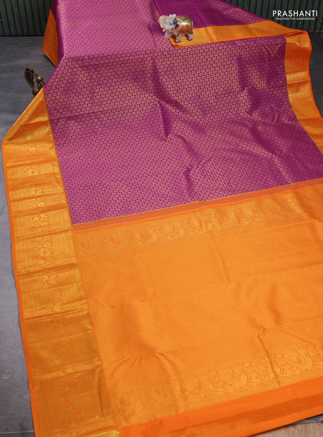 Kanchipuram silk saree magenta pink and orange with allover zari woven brocade weaves and long zari woven border