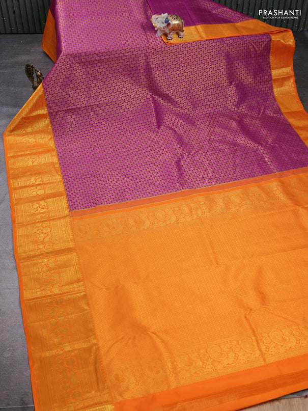 Kanchipuram silk saree magenta pink and orange with allover zari woven brocade weaves and long zari woven border