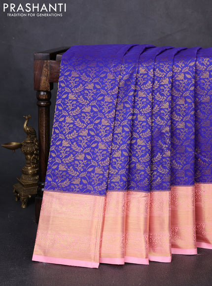 Kanchipuram silk saree blue and peach pink with allover zari woven brocade weaves and zari woven border