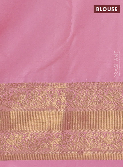 Kanchipuram silk saree blue and peach pink with allover zari woven brocade weaves and zari woven border