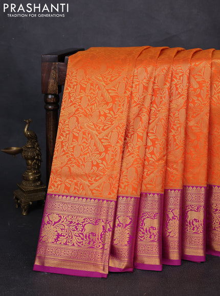 Kanchipuram silk saree orange and magenta pink with allover zari woven brocade weaves and zari woven border