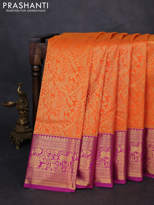 Kanchipuram silk saree orange and magenta pink with allover zari woven brocade weaves and zari woven border