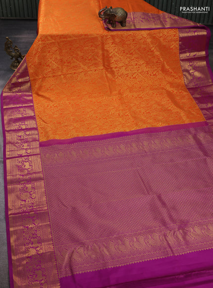 Kanchipuram silk saree orange and magenta pink with allover zari woven brocade weaves and zari woven border