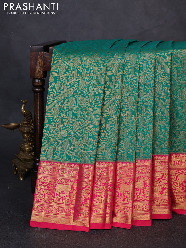 Kanchipuram silk saree green and pink with allover zari woven brocade weaves and zari woven border