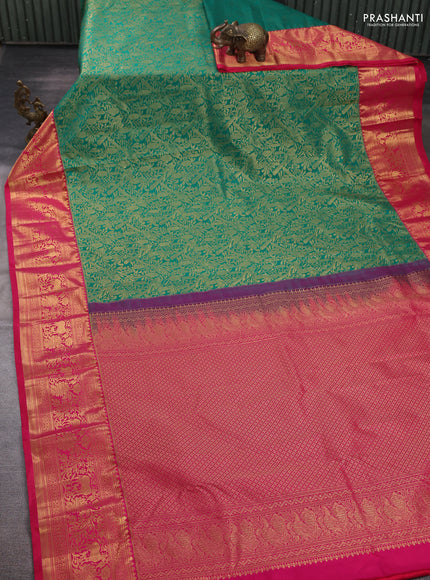 Kanchipuram silk saree green and pink with allover zari woven brocade weaves and zari woven border
