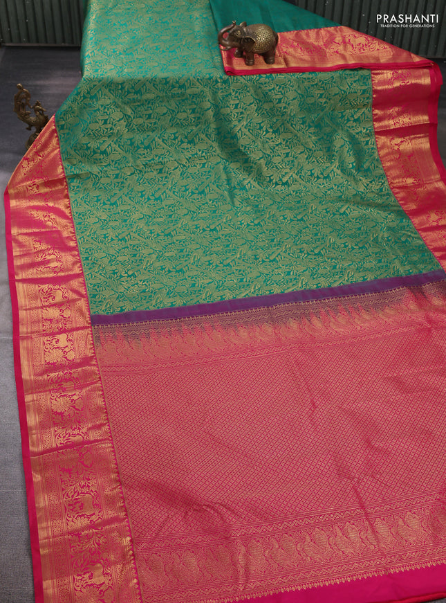 Kanchipuram silk saree green and pink with allover zari woven brocade weaves and zari woven border