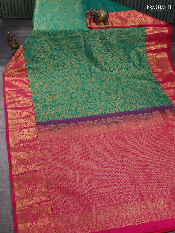 Kanchipuram silk saree green and pink with allover zari woven brocade weaves and zari woven border
