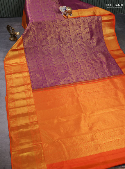 Kanchipuram silk saree dark magenta pink and orange with allover zari woven brocade weaves and long rich zari woven border