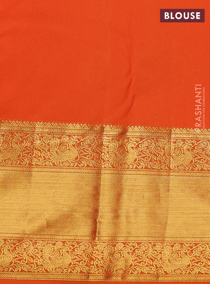 Kanchipuram silk saree dark magenta pink and orange with allover zari woven brocade weaves and long rich zari woven border