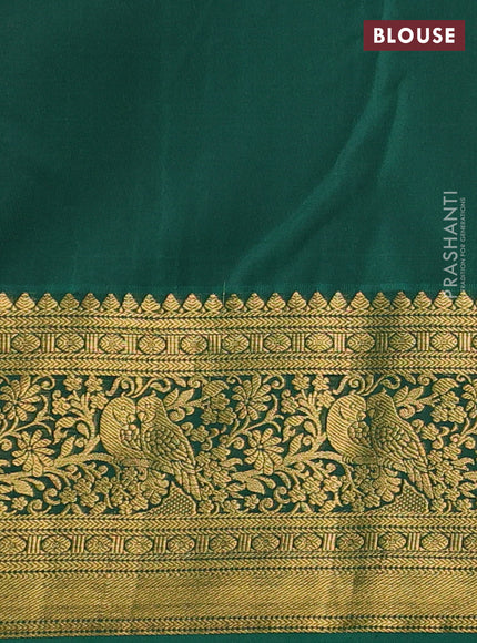 Kanchipuram silk saree red and green with allover zari woven brocade weaves and zari woven border
