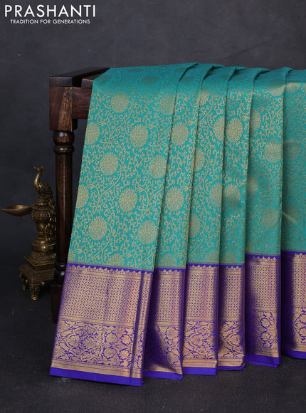 Kanchipuram silk saree teal green and violet with allover zari woven brocade weaves and zari woven border