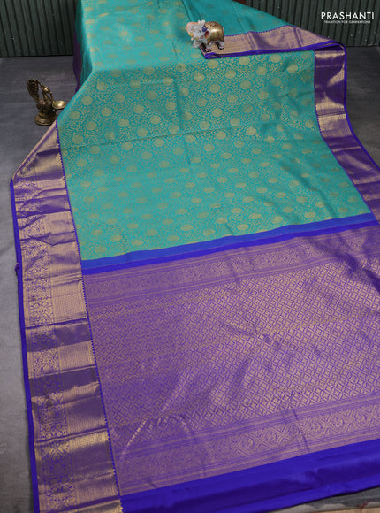 Kanchipuram silk saree teal green and violet with allover zari woven brocade weaves and zari woven border