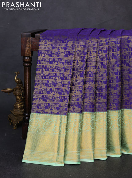 Kanchipuram silk saree violet and light green with allover zari woven brocade weaves and long zari woven border