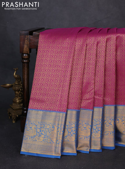 Kanchipuram silk saree magenta pink and blue with allover zari woven brocade weaves and long zari woven border