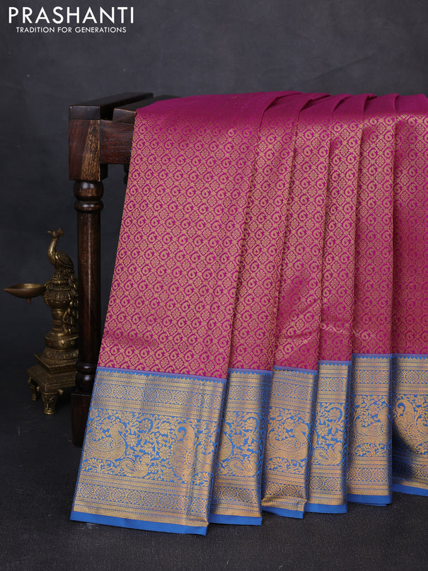 Kanchipuram silk saree magenta pink and blue with allover zari woven brocade weaves and long zari woven border