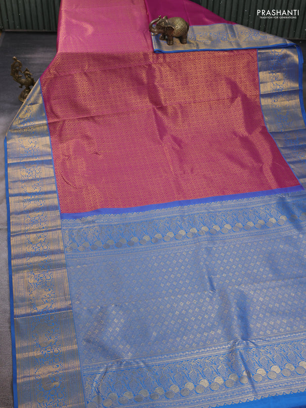 Kanchipuram silk saree magenta pink and blue with allover zari woven brocade weaves and long zari woven border