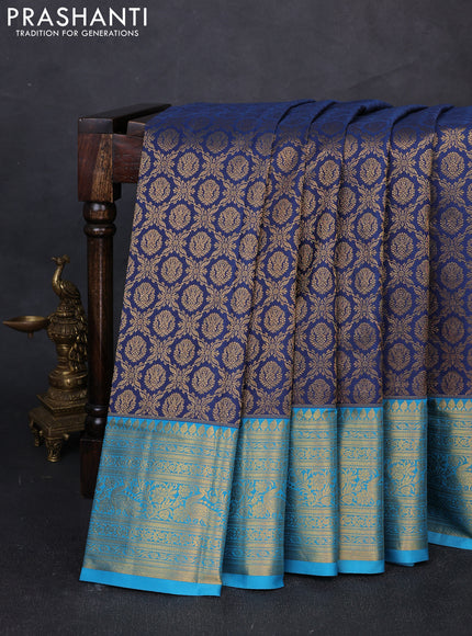 Kanchipuram silk saree blue and cs blue with allover zari woven brocade weaves and zari woven border