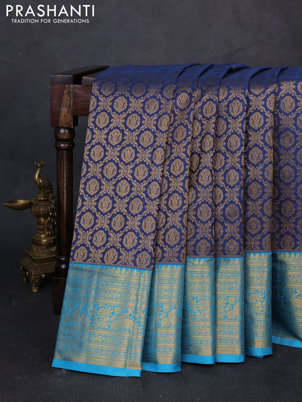 Kanchipuram silk saree blue and cs blue with allover zari woven brocade weaves and zari woven border