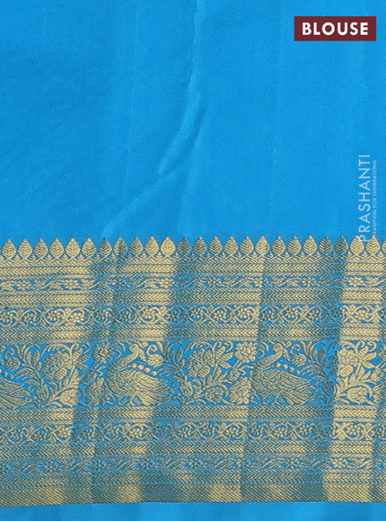 Kanchipuram silk saree blue and cs blue with allover zari woven brocade weaves and zari woven border