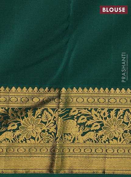 Kanchipuram silk saree red and green with allover zari woven brocade weaves and zari woven border