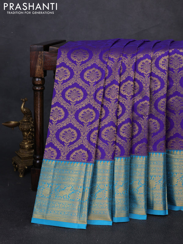 Kanchipuram silk saree violet and cs blue with allover zari woven brocade weaves and long zari woven border