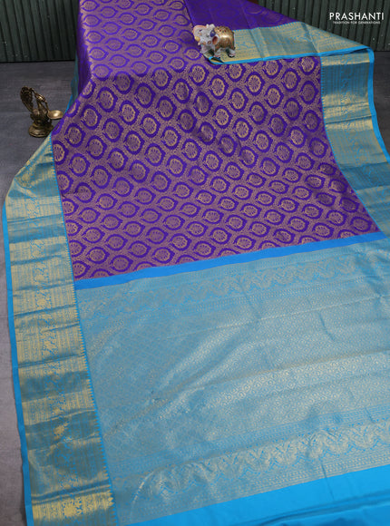 Kanchipuram silk saree violet and cs blue with allover zari woven brocade weaves and long zari woven border