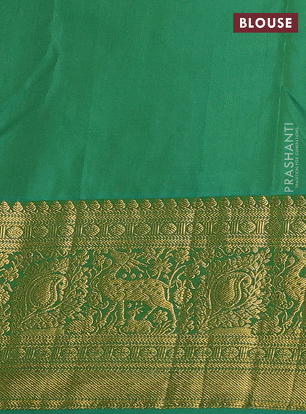 Kanchipuram silk saree magenta pink and green with allover zari woven brocade weaves and zari woven border