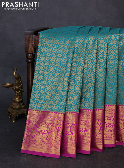 Kanchipuram silk saree teal green and magenta pink with allover zari woven brocade weaves and zari woven border