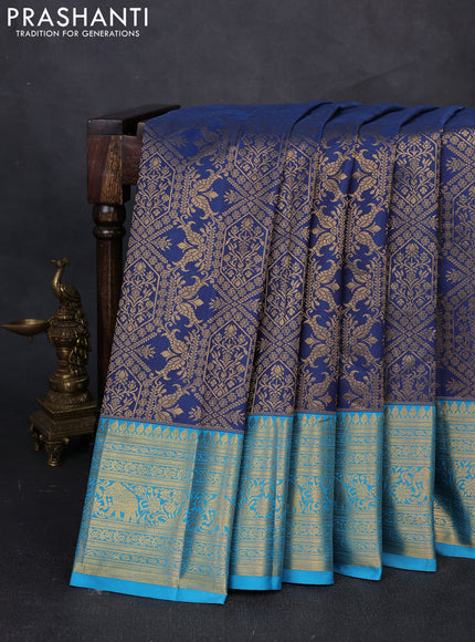 Kanchipuram silk saree peacock blue and cs blue with allover zari woven brocade weaves and zari woven border