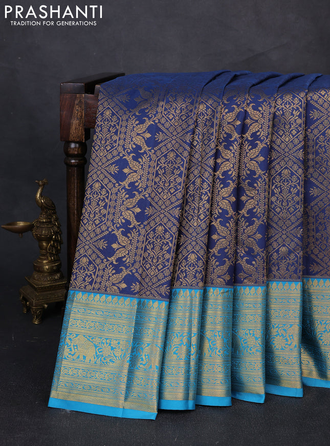 Kanchipuram silk saree peacock blue and cs blue with allover zari woven brocade weaves and zari woven border