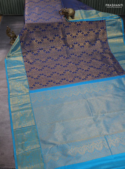 Kanchipuram silk saree peacock blue and cs blue with allover zari woven brocade weaves and zari woven border