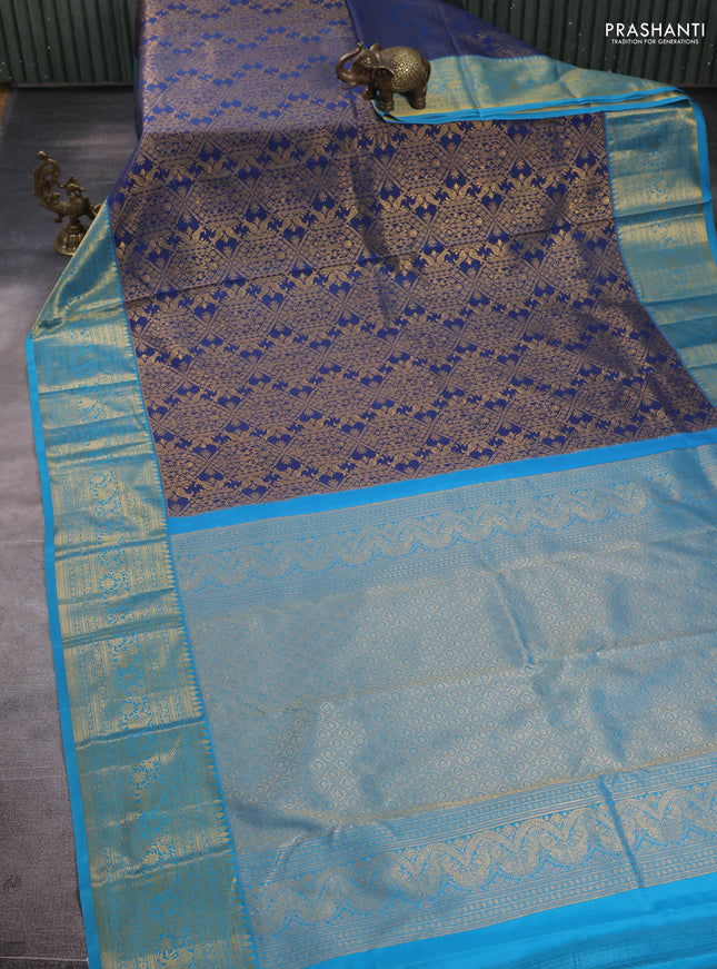 Kanchipuram silk saree peacock blue and cs blue with allover zari woven brocade weaves and zari woven border