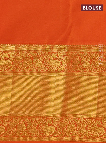 Kanchipuram silk saree dark magenta pink and orange with allover zari woven brocade weaves and long rich zari woven border