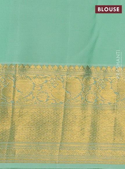 Kanchipuram silk saree violet and light green with allover zari woven brocade weaves and long zari woven border