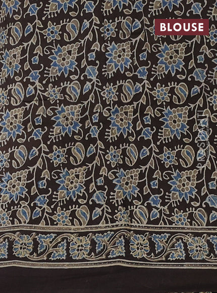 Dola silk saree black with allover ajrakh prints and zari woven border
