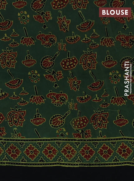 Dola silk saree green shade with allover ajrakh prints and zari woven border