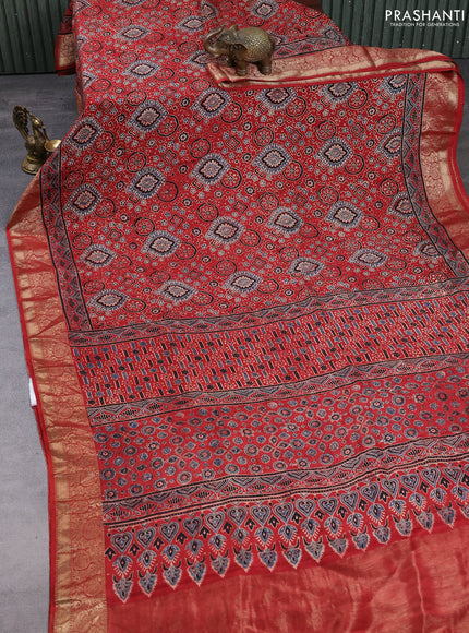 Dola silk saree maroon with allover ajrakh prints and zari woven border