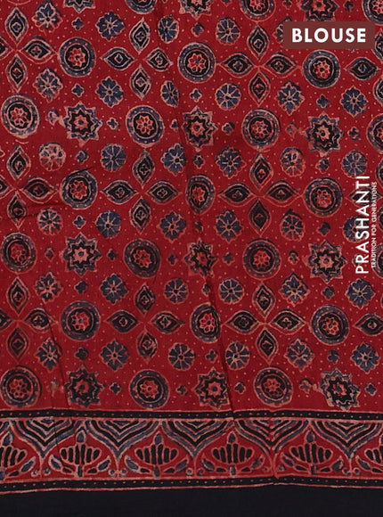 Dola silk saree maroon with allover ajrakh prints and zari woven border
