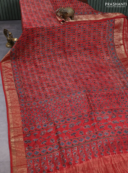 Dola silk saree maroon with allover ajrakh prints and zari woven border