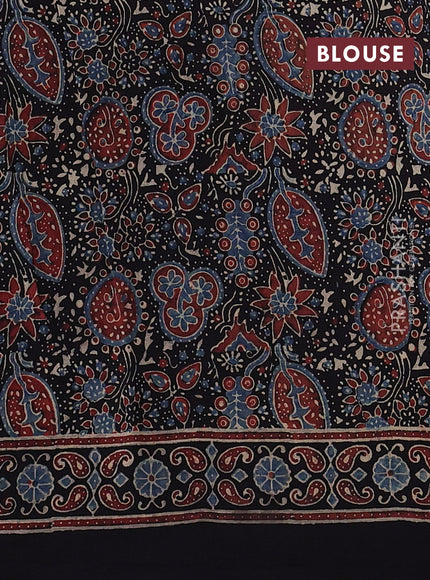 Dola silk saree black and blue shade with allover ajrakh butta prints and zari woven border