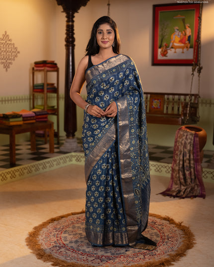 Dola silk saree indigo blue with allover ajrakh butta prints and zari woven border