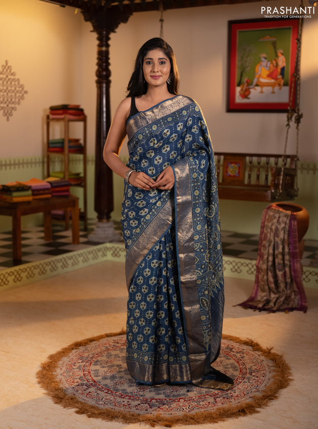 Dola silk saree indigo blue with allover ajrakh butta prints and zari woven border
